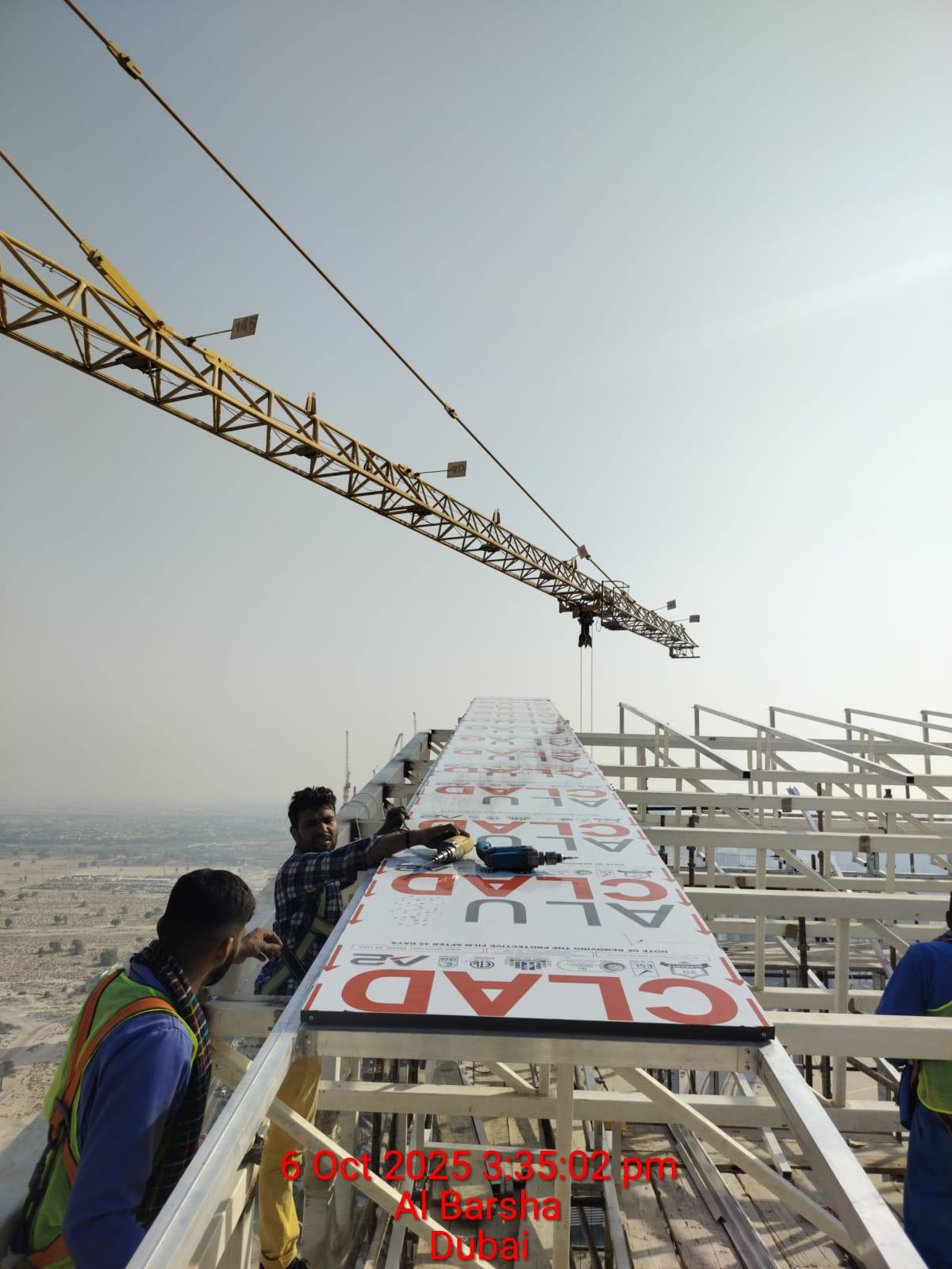 High-rise aluminum composite panel cladding installation